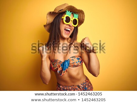 [[stock_photo]]: Woman In A Bikini With A Winners Gesture