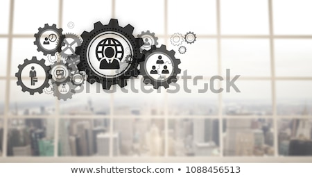 Stock fotó: People In Cogs Graphics Against Office Background