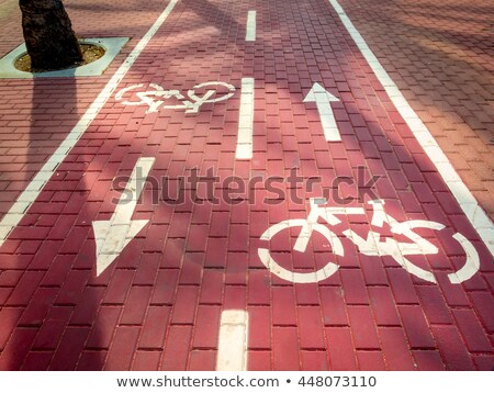 Stock photo: Bike Lane Separated From Traffic With Signal