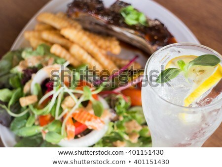 Delicious Barbecued Ribs And Lemon Soda Drink Stock foto © nalinratphi