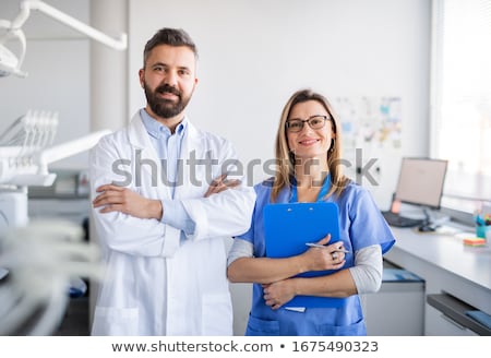 Stock fotó: Dental Assistant Looking At Camera