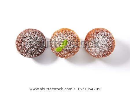 Stockfoto: Three Biscuit Cupcakes With Nuts