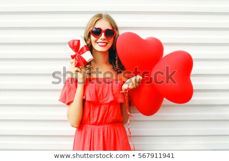 ストックフォト: Woman Holding A Heart Shaped Box