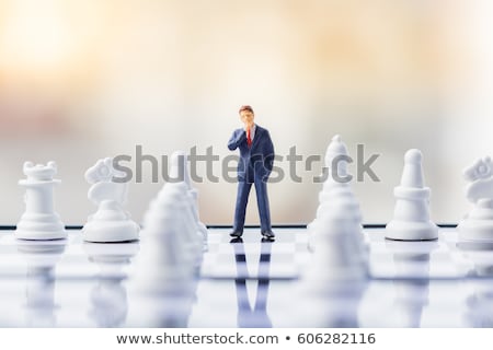 Stockfoto: Businessman And Chess Piece Decision Making Concept