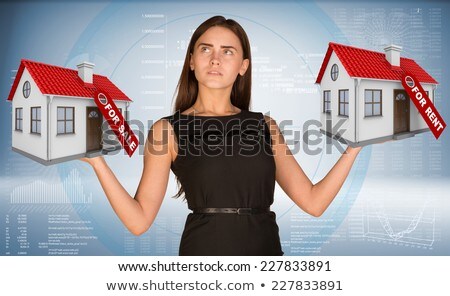 Businesswoman Holding Two House With Tags For Sale And Rent Stockfoto © cherezoff