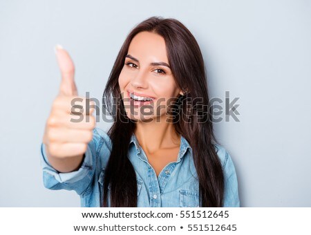 Stok fotoğraf: Woman With Thumbs Up