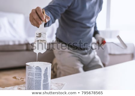 Stock photo: Paint Holding Brush And Pot