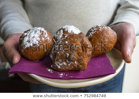 Сток-фото: Hand Showing Dutch Oliebol Or Fritter