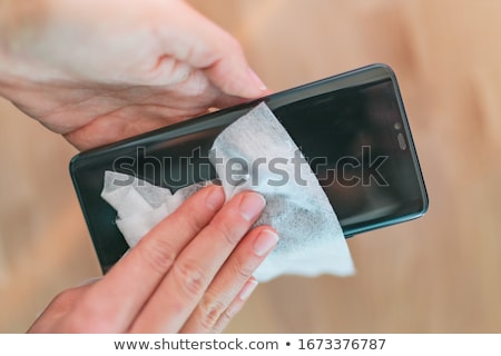 Phone Screen Disinfecting Wipe Woman Cleaning Removing Germs With Antibacterial Wet Wipes For Corona Zdjęcia stock © Maridav