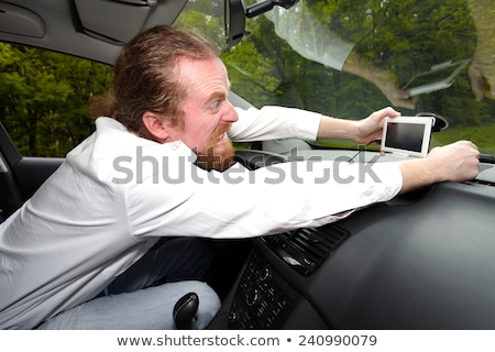 Stockfoto: Driver Furious On Gps Navigation A Wrong Way