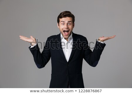 Stok fotoğraf: Image Of European Businessman 30s In Formal Suit Screaming And T