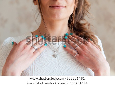 Stock photo: The Bride Wears A Necklace Around His Neck