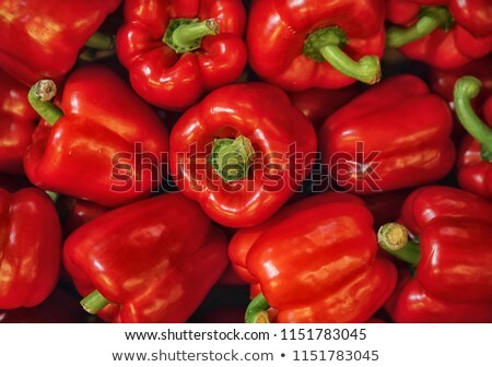 [[stock_photo]]: Red Pepper On Red Background