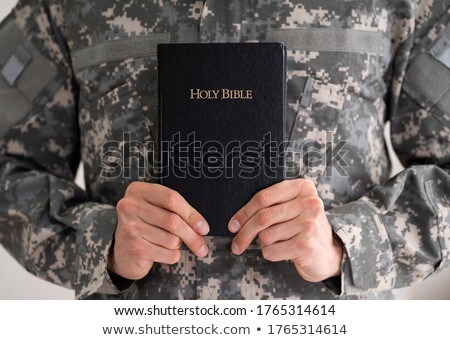 Zdjęcia stock: Patriotic Military Army Soldier Holding Bible