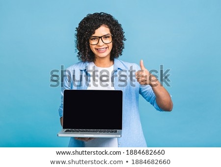 Zdjęcia stock: Beautiful Young Woman Face Over Blue Background