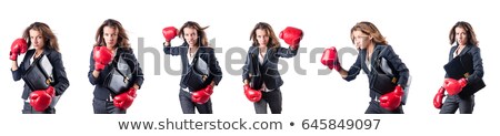 Businesswoman Punching Isolated On White Stock photo © Elnur