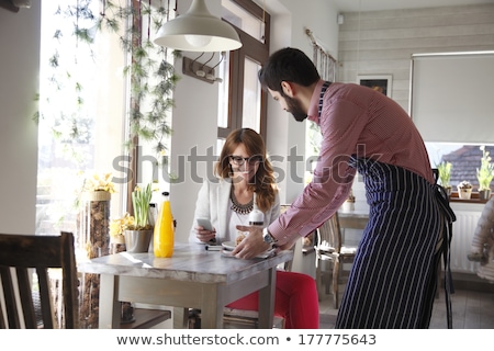 Foto stock: Cappuccino Served On Table In Restaurant