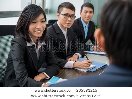 Foto stock: Asian Business Partners Having Negotiations