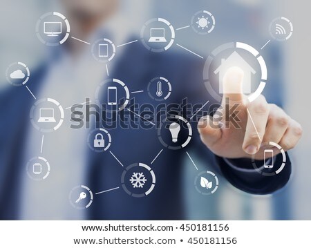 Stok fotoğraf: Hands Using Digital Tablet With Home Security Icons