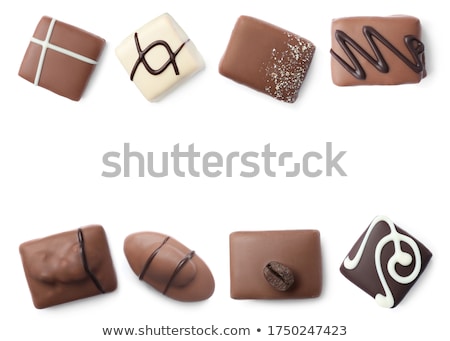 Imagine de stoc: Many Different Candies In Coconut On White Background