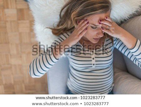 Stockfoto: A Woman Feel Sick Lying Down On Bed