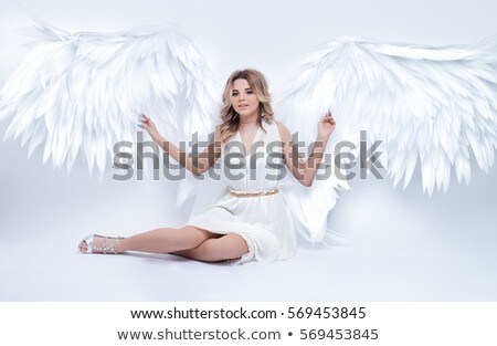 ストックフォト: Angelic Young Woman Posing On White