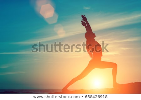 Stockfoto: Girl Doing Pilates At Sunset