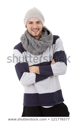 Foto d'archivio: Portrait A Frozen Young Man Dressed In Sweater