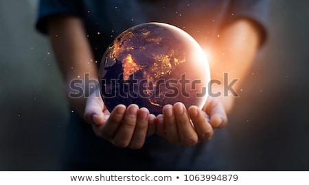 商業照片: Earth In Hand