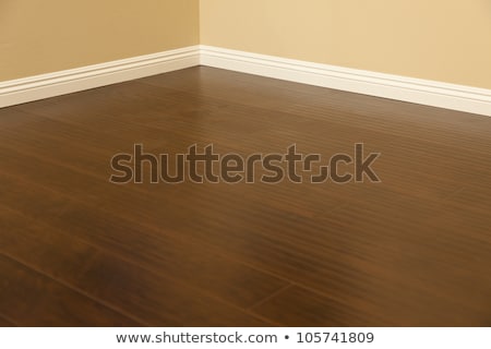 Stok fotoğraf: Newly Installed Brown Laminate Flooring And Baseboards In Home