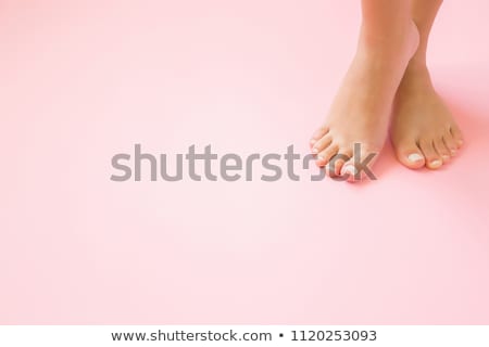 [[stock_photo]]: Well Groomed Female Legs On Pink Background