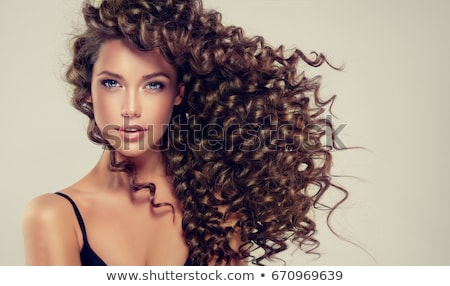 Stockfoto: Beautiful Woman With Healthy Long Curly Hair