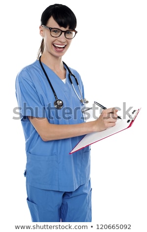 Joven médico escribir notas Foto stock © stockyimages