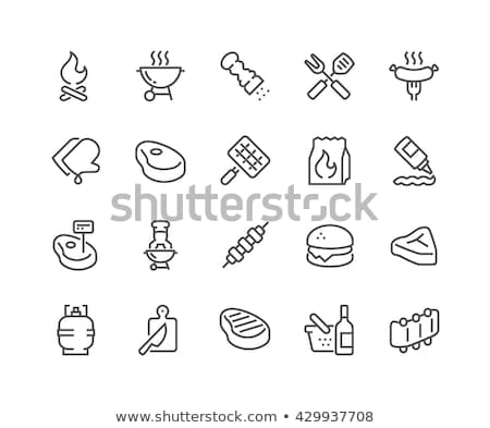 Stock photo: Hamburgers On The Grill With Stripes Outdoors