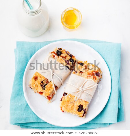 Stock fotó: Oatmeal Oat Bars With Dried Cranberry And Raising Healthy Breakfast