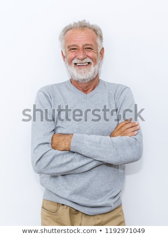 Stok fotoğraf: Portrait Of A Happy Senior Man In Isolation