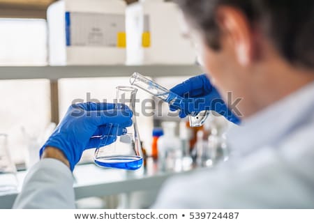 Stockfoto: Scientist Performing An Experiment