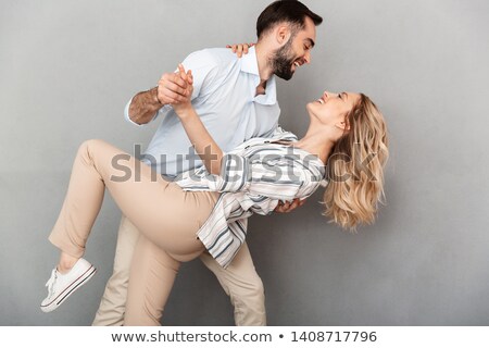 Stockfoto: Portrait Of Young Romantic Couple Man And Woman In Basic Clothin