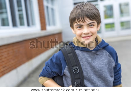 Stockfoto: Nice Pre Teen Boy Outside At School Having Good Time