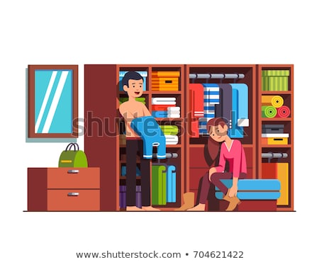 Foto stock: Female In Changing Room Wearing Dresses Vector