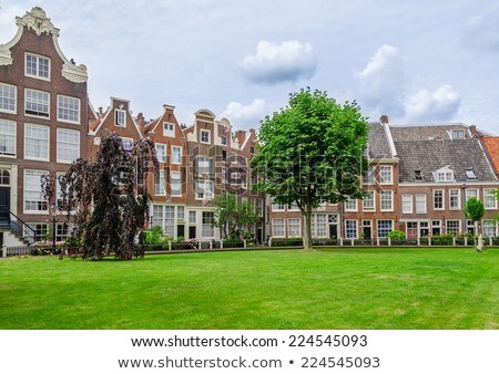 Сток-фото: Old Houses At The Historical Begijnhof In Amsterdam