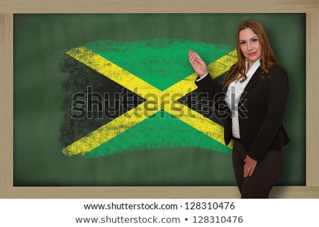 Teacher Showing Flag Ofjamaica On Blackboard For Presentation Ma [[stock_photo]] © vepar5