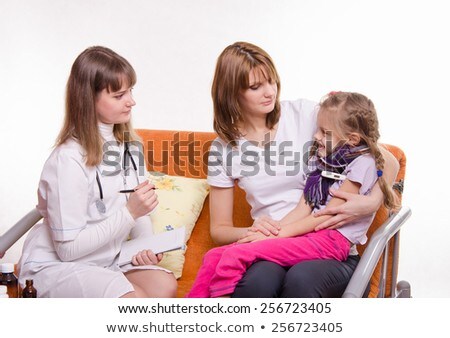 Stock photo: Sick Girl Sitting On Lap Of Mother And Pediatrician Inspection