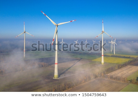 Stok fotoğraf: Windturbines In The Fog