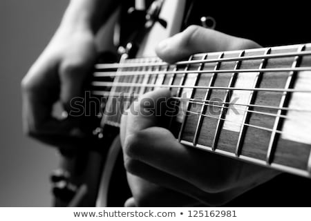 Сток-фото: Playing Guitar In The Recording Studio