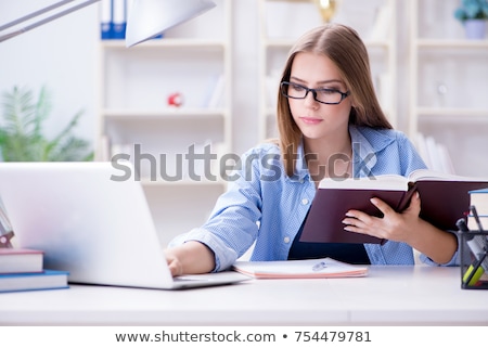 Teenage Girl At Desk Revising Stock foto © Elnur