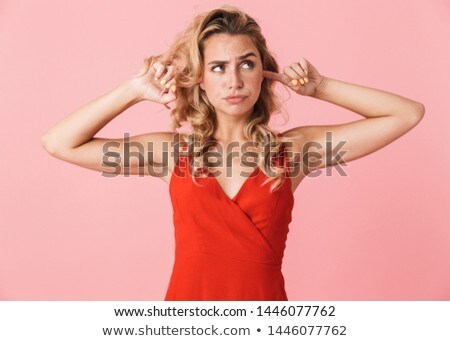 Stok fotoğraf: Blond Woman Covering Ears