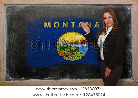 Teacher Showing Flag Ofmontana On Blackboard For Presentation Ma [[stock_photo]] © vepar5