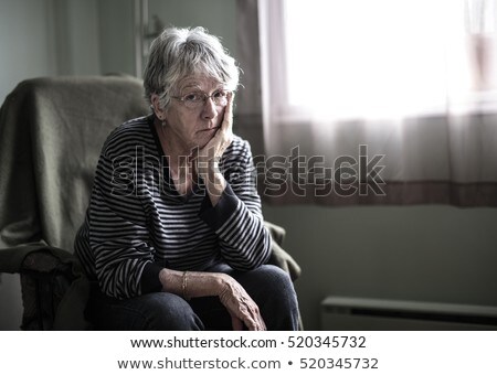 Worried Senior Woman At Home Felling Very Bad ストックフォト © Lopolo