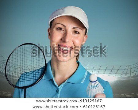 Stockfoto: Badminton Player Against Blue Sky And Stadium